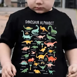 Camiseta divertida con estampado del alfabeto de dinosaurio para niños, bonita camiseta de manga corta para todas las estaciones, camiseta para niñas